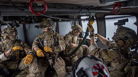 Coast Guardsmen From Maritime Security Response Team Msrt West Prepare Fast Rope Onto The Deck