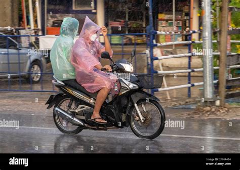 Samut Prakan Thailand Sep Couple In Raincoats Drive In Rain