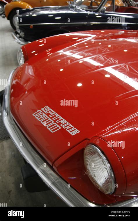 Vintage Red Triumph Spitfire Sports Car At Motor Show Stock Photo