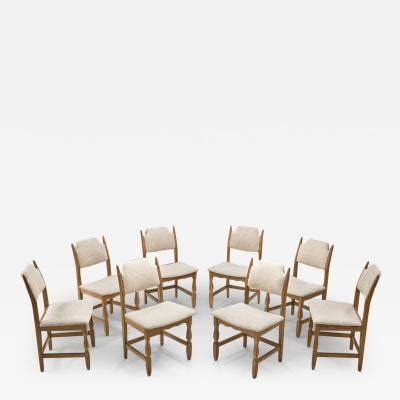 Henning Kjaernulf Set of Eight Oak Dining Chairs by Henning Kjærnulf