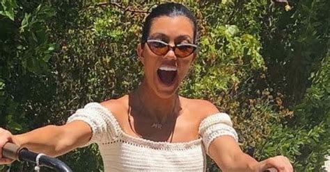 Kourtney Kardashian Flaunts Her Figure In Skimpy Hot Pants While Riding A Bike