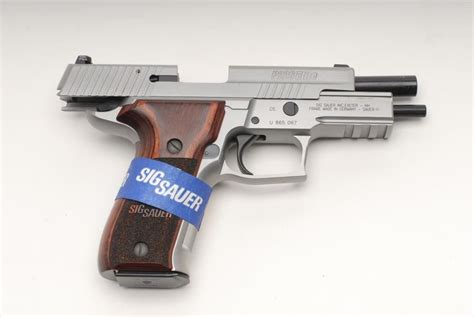 Sig Sauer P226 Elite Semi Auto Pistol 9mm 4 ½” Barrel Stainless Finish Rosewood Grips Short R