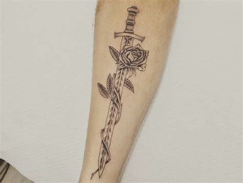 Share 72+ sword rose tattoo latest - in.cdgdbentre