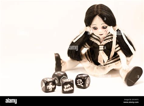 Living Dead Doll And Dices With Symbols Stock Photo Alamy