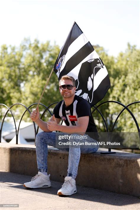 A Collingwood Fan Poses For A Photo During The 2023 Afl Grand Final