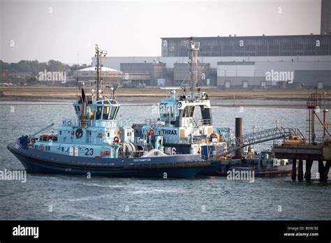 Merchant Shipping Tug Boat Vessel Ships Docked At Fawley Oil Refinery