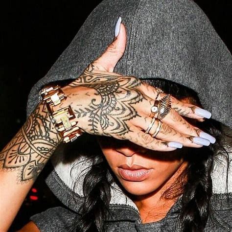 Pin By Sara Mårtensson On Tattoo Rihanna Hand Tattoo Classy Tattoos Henna Tattoo Hand