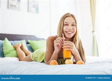 Girl Drinking Juice And Relaxing In Bedroom Stock Image Image Of Girl