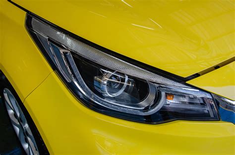 Yellow car headlights 1901522 Stock Photo at Vecteezy