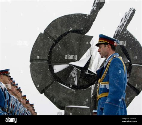 A Serbian Military Honor Guard Pay Homage To The Victims Of The