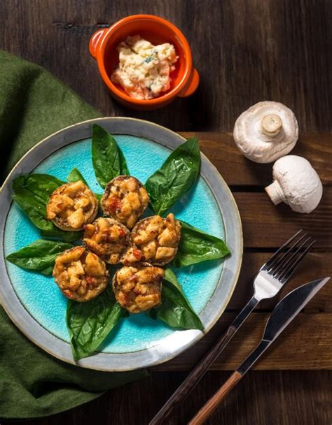 Premium Photo Stuffed Mushrooms Champignons On A Plate With Fresh