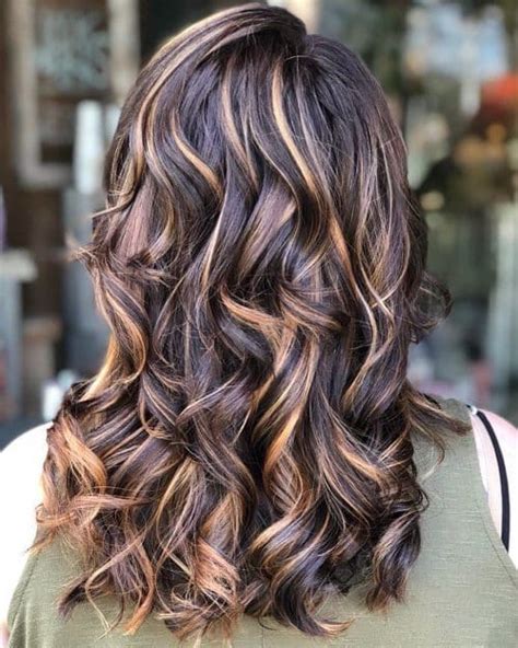 Dark Brown Hair With Caramel Highlights And Layered Cut