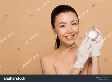 Attractive Happy Nude Asian Girl Latex Stock Photo