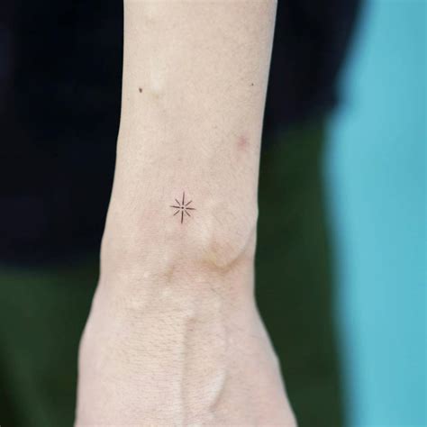 Minimalistic Style North Star Tattoo Located On The