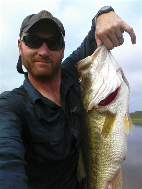 Late Summer Georgia Largemouth In Fisherman