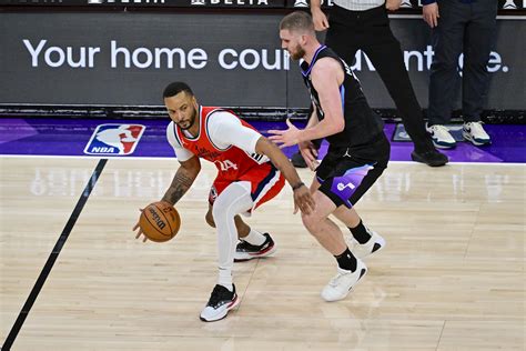 La Clippers Guard Norman Powell Dribbles Against Utah Jazz Guard