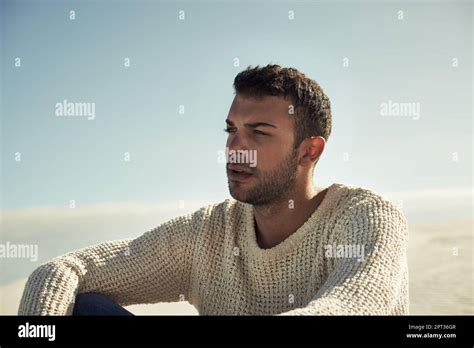 Desert Masculinity A Ruggedly Handsome Young Man Enjoying The Beach