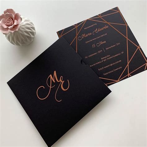 A Black And Rose Gold Wedding Card With The Initials Mr And Mrs On It