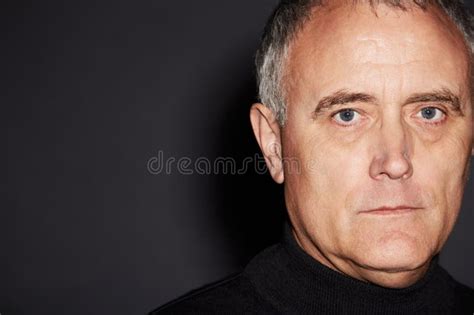 Portrait Of Mature Man In Studio With Serious Face Confidence And Wise
