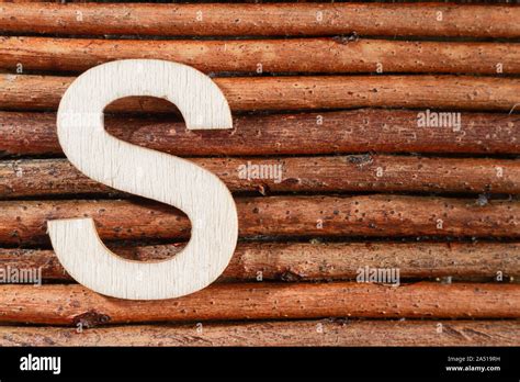 Letter S Of Wood Made Alphabet Top View And Space For Text Stock Photo