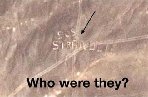huge sos stranded sign   remote desert  google earth
