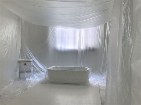 White Bath Tub Under Canopy