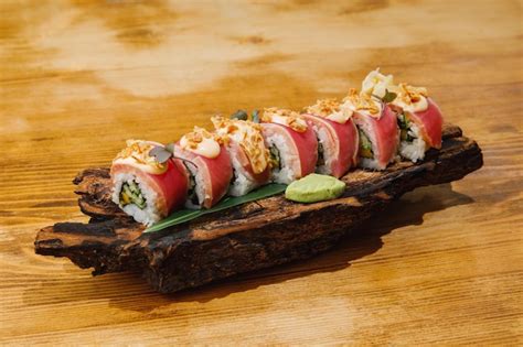 Premium Photo | Asian sushi on wooden board
