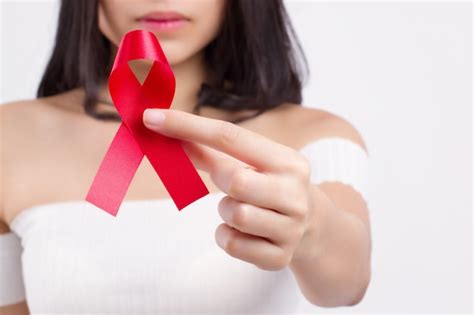 Free Photo Woman Hand Holding Red Ribbon Hiv Awareness Concept World