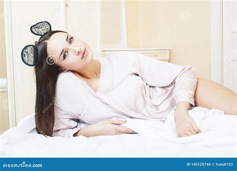 Young Pretty Brunette Woman Laying In Bed Alone Waiting Sexy Lifestyle People Concept Stock