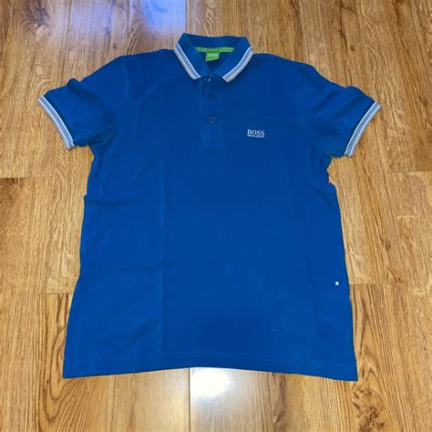 Hugo Boss Green polo shirt size small. Worn a few... - Depop