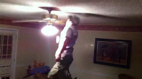 Guy Bumps The Ceiling Fan With His Head And It Falls To The Floor