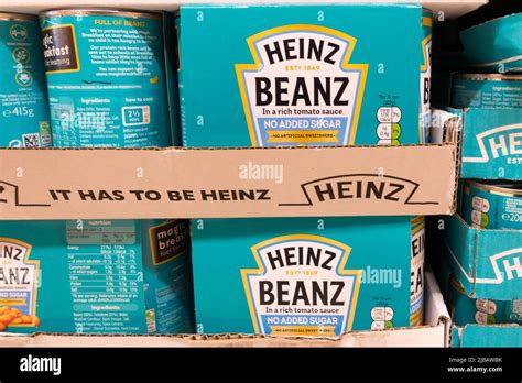 Heinz Beanz The Breakfast Beans Tins In Store Shelf Stock Photo Alamy