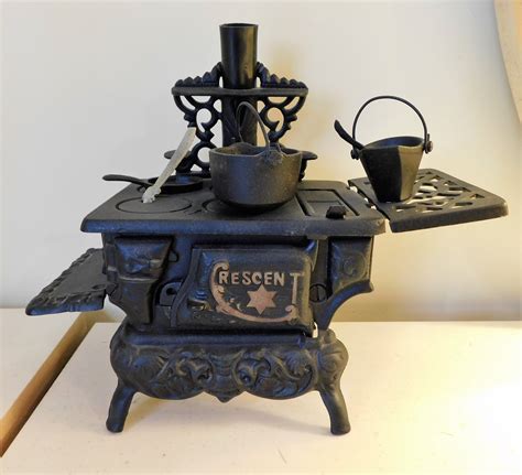 Lot Detail Crescent Miniature Cast Iron Stove With Pots And Utensils