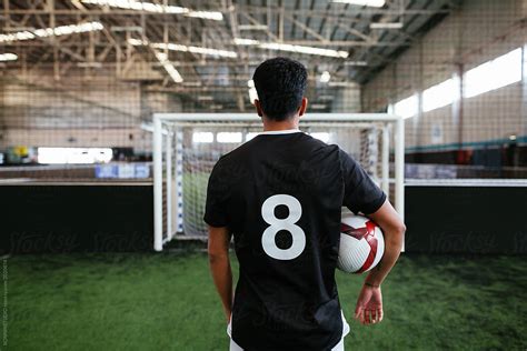 Soccer Player Training In Football Field By Stocksy Contributor