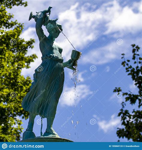 Topless Woman Pouring Water Statue In Fountain Park Editorial Stock