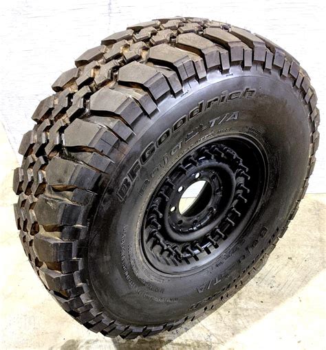 BF Goodrich Baja T A 37X12 50R16 5LT Radial Tire Mounted On 24 Bolt Rim