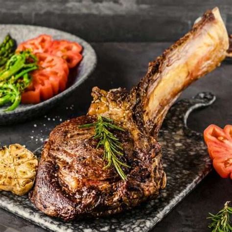 Garlic Butter Tomahawk Steaks Recipe Derrick Riches