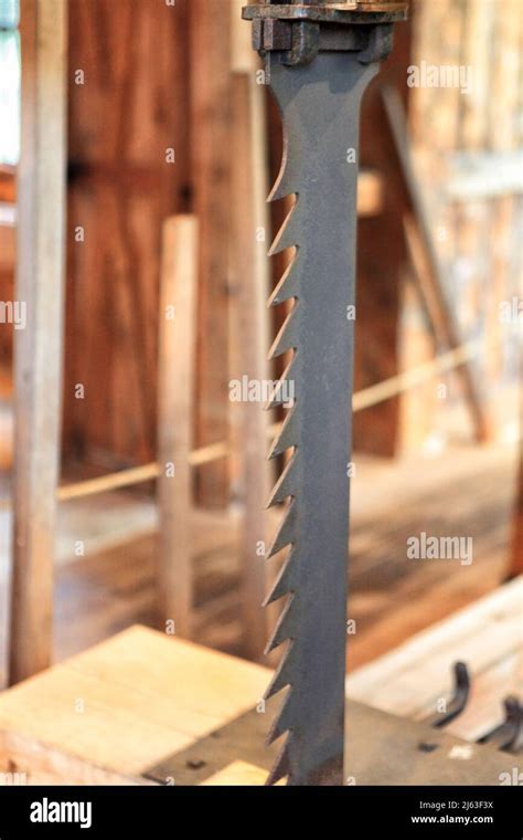 The Interior Of A Vintage Sawmill Showing The Saw Blade For Making