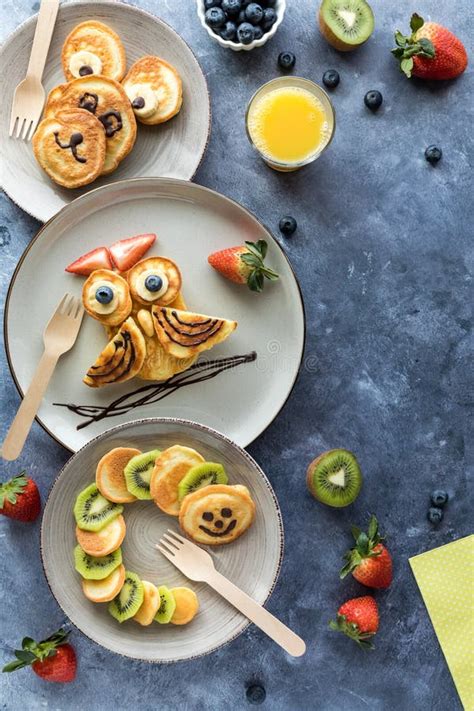 Pancakes in the Shapes of Critters, Served with Fruit and Juice for ...