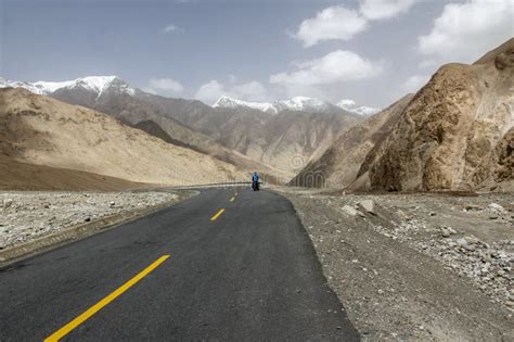 Take A Low Angle Photograph Of A Newly Built Straight Asphalt Road