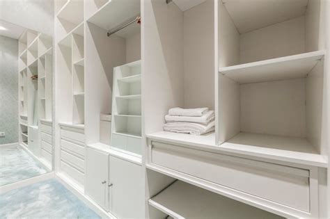 Premium Photo Interior Of A Walkin Closet With Shelves Drawers And