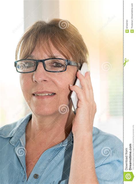 Mature Woman Talking On Mobile Phone Light Effect Stock Image Image