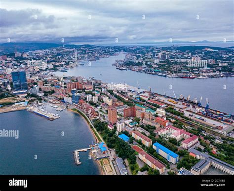 Russia, Primorsky Krai, Vladivostok, Aerial view of coastal city on ...