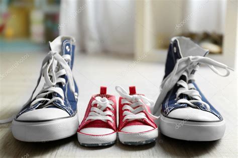 Big and small shoes Stock Photo by ©belchonock 116897168