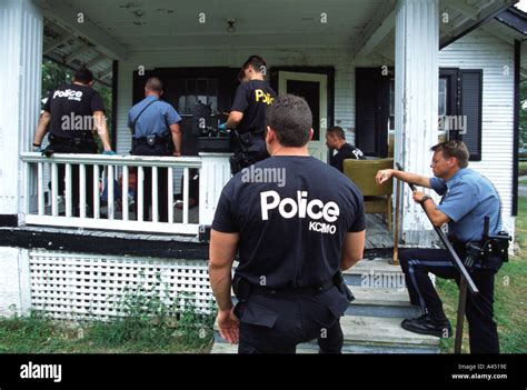 Police officers doing paper work at crime scene. Kansas City, MO, PD ...