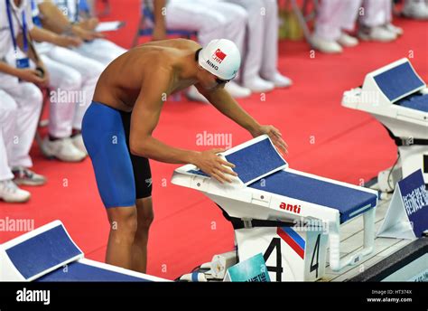 China 7th Mar 2017 Chinese Swimmer Ning Zetao Does Warm Up Exercises