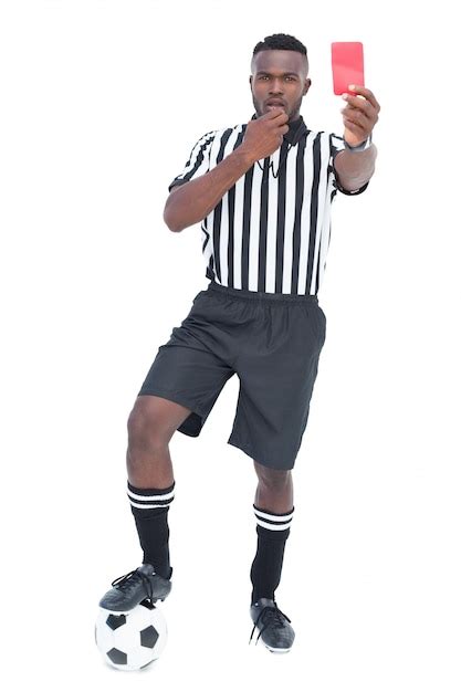 Premium Photo Serious Referee Showing Red Card