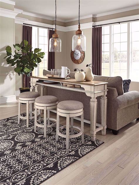 Picture Of Realyn Sofa Bar Table With Three Stools Counter Height Pub