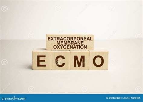 Ecmo Word Written On Wooden Blocks And Stethoscope On Light Blue