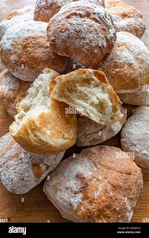 A Pile Of Freshly Baked Ciabatta White Crusty Home Made Rolls On A